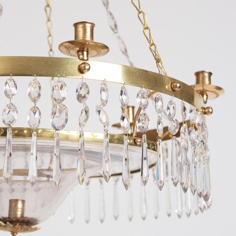 A late Gustavian gilt brass and cut glass seven-light chandelier, late 18th century.