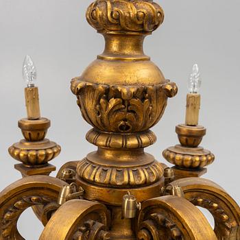 A baroque style chandelier, around 1900.