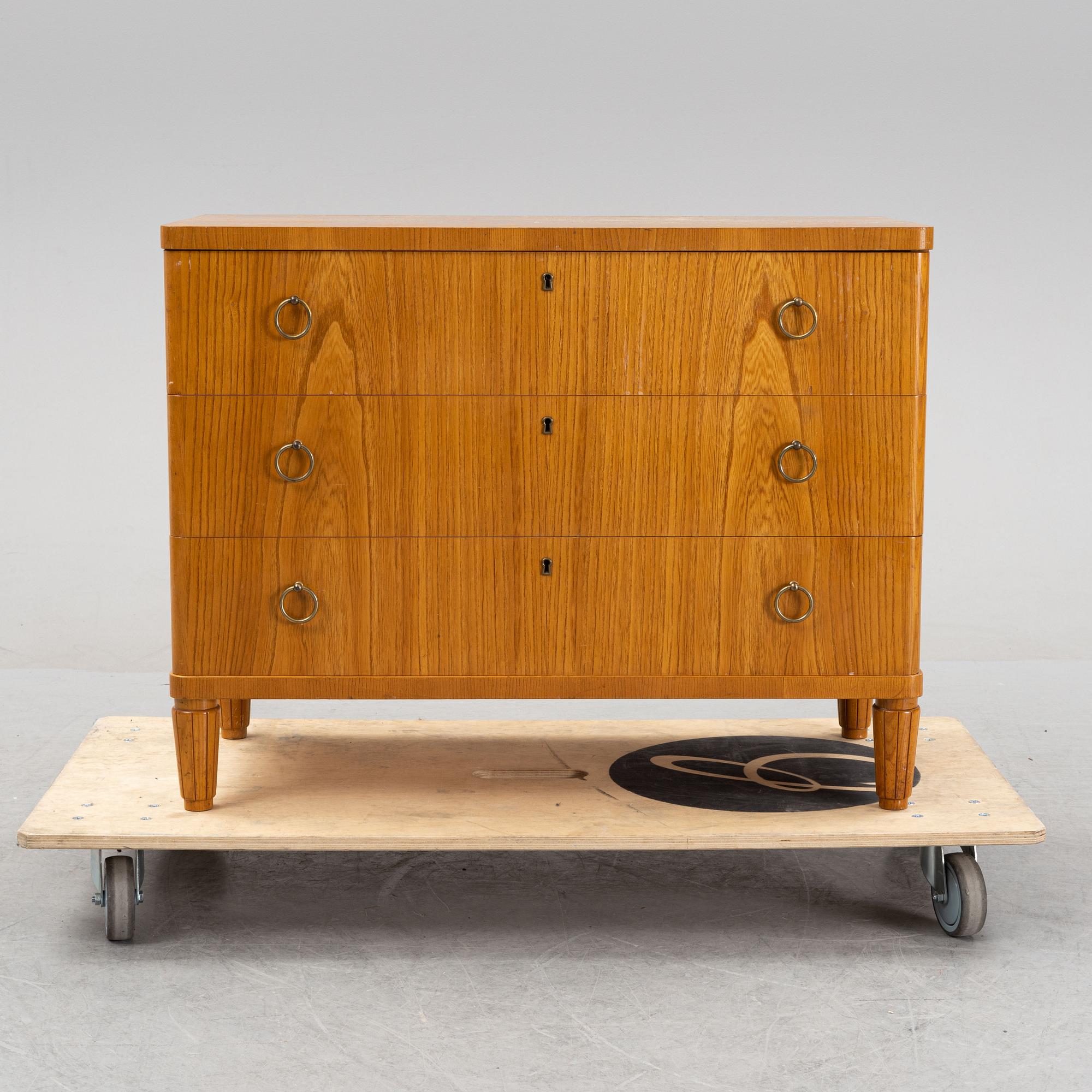 An elm wood veneered dresser, mid 20th Century.