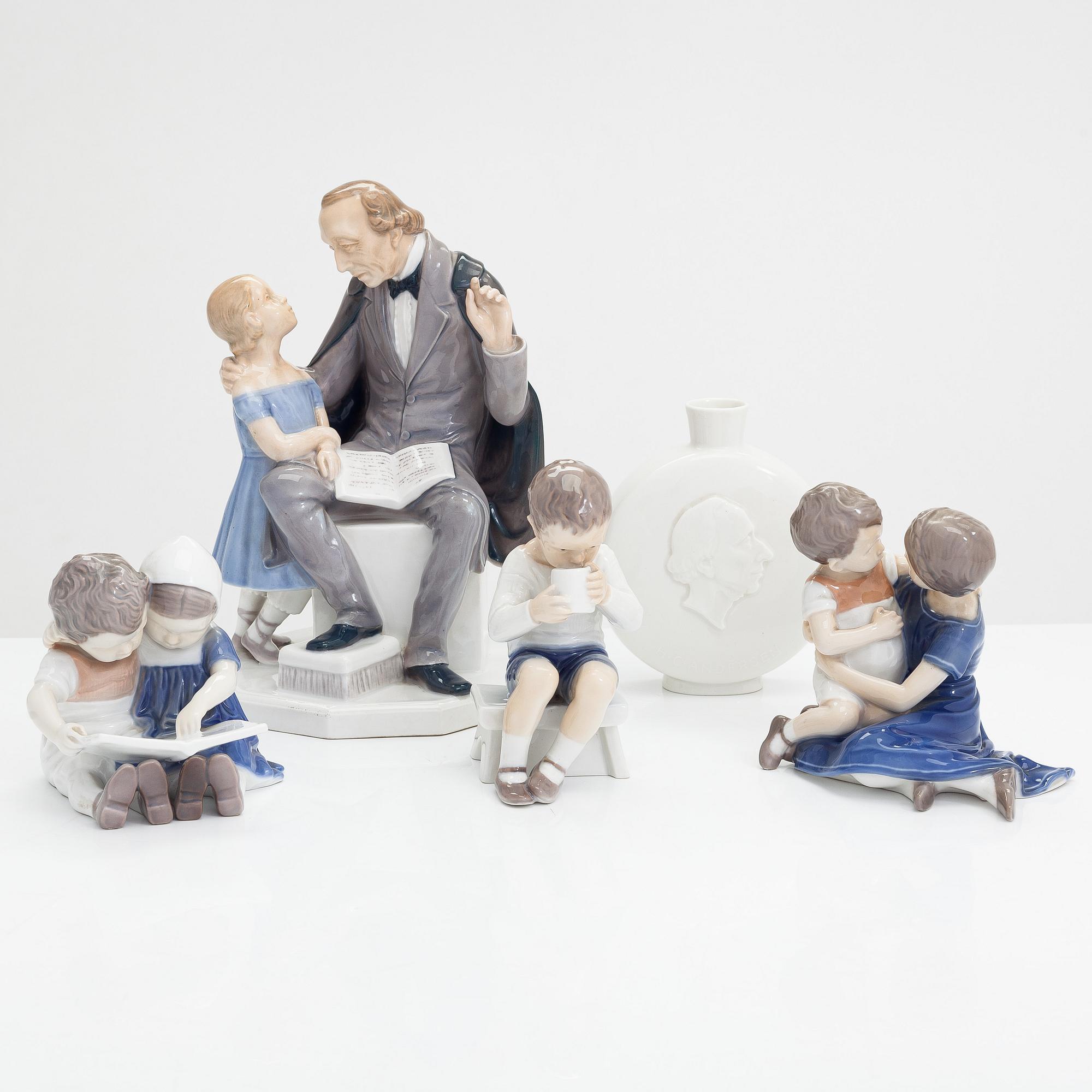 Four Bing & Grondahl figurines and a Royal Copenhagen vase, mid 20th century.
