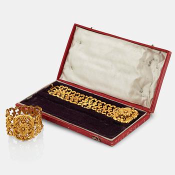 839. A pair of 19th century 18K gold bracelets.