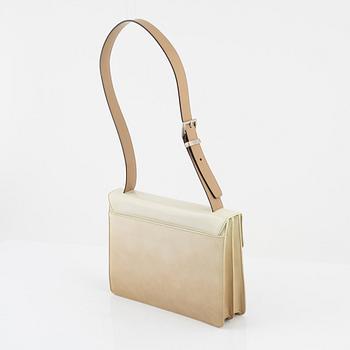 Prada, a beige patent leather bag.