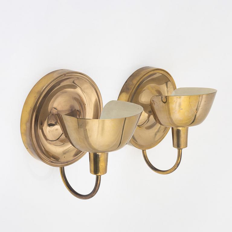 Josef Frank, a pair of model '2389' brass wall lights, Firma Svenskt Tenn.