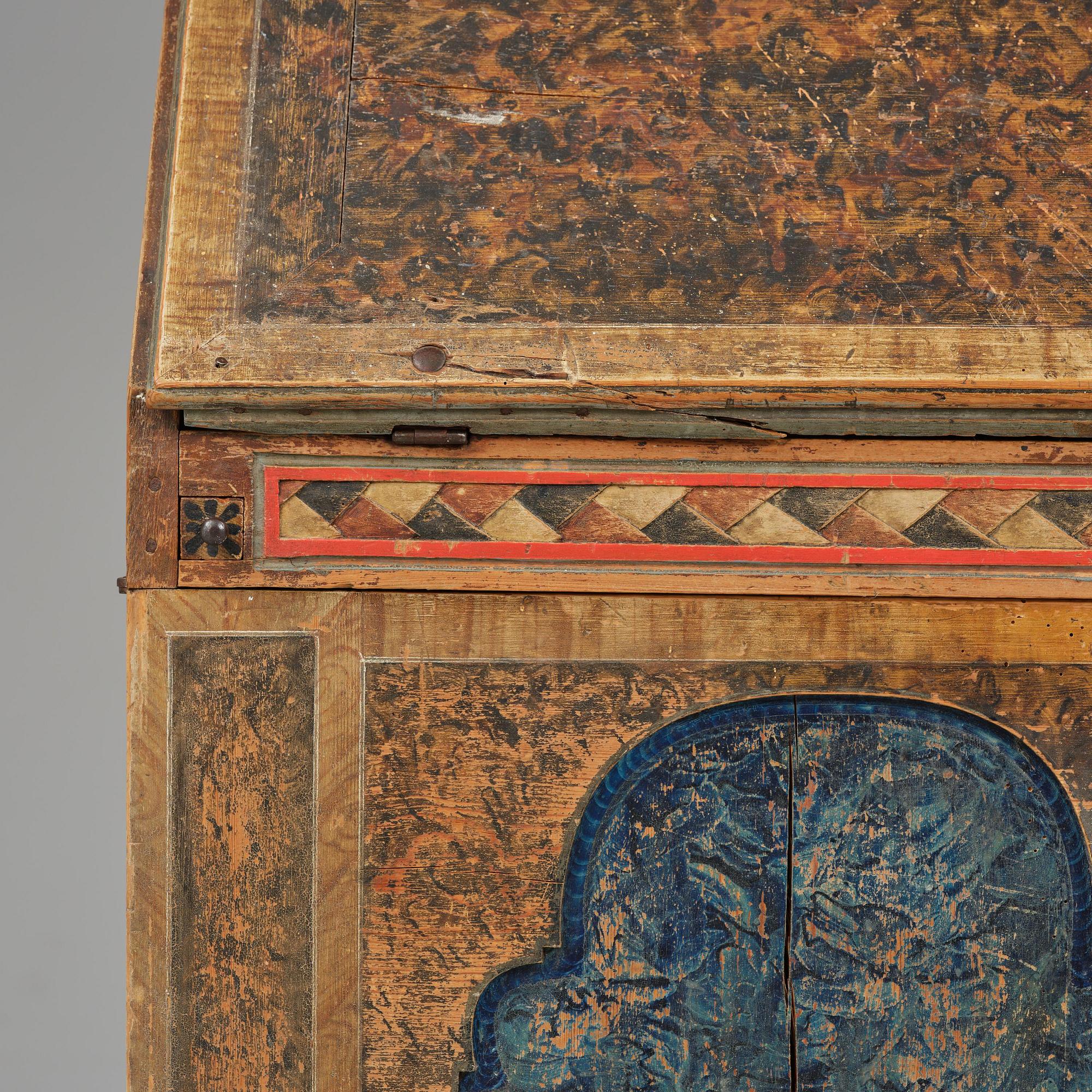 A polychrome-painted folk art cabinet from Värmland, Sweden, dated 1818.