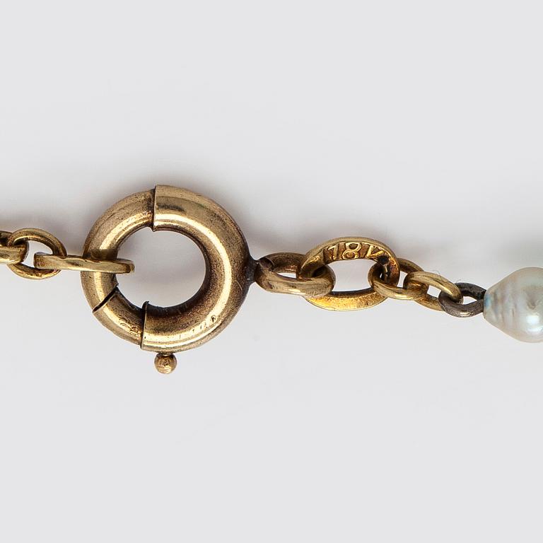 A 17K gold necklace with emeralds and cultured pearls.