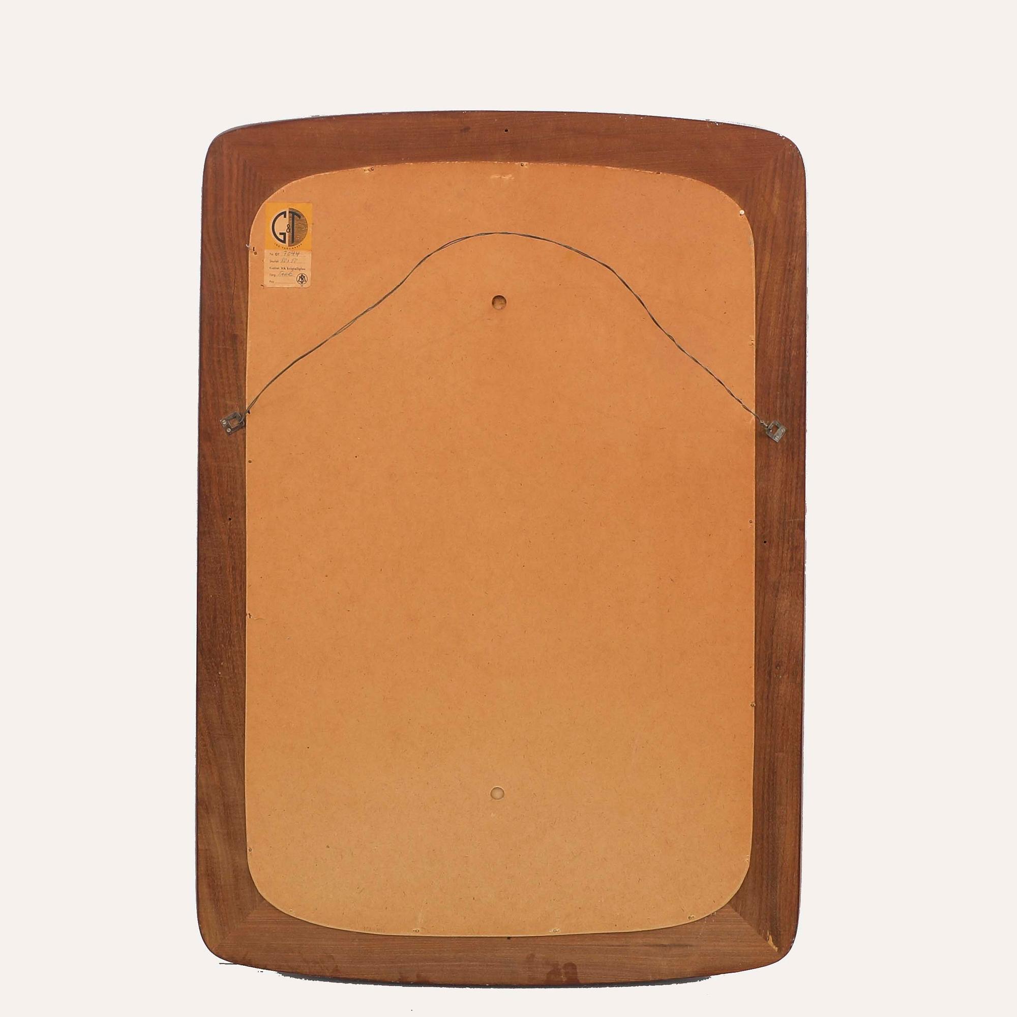 A 1950/60s walnut G&T mirror.