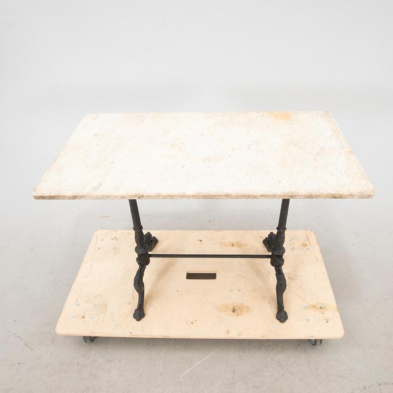 A marble and cast iron garden table first half of the 20th century.