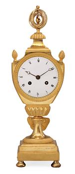 A French Empire early 19th century gilt bronze mantel clock.