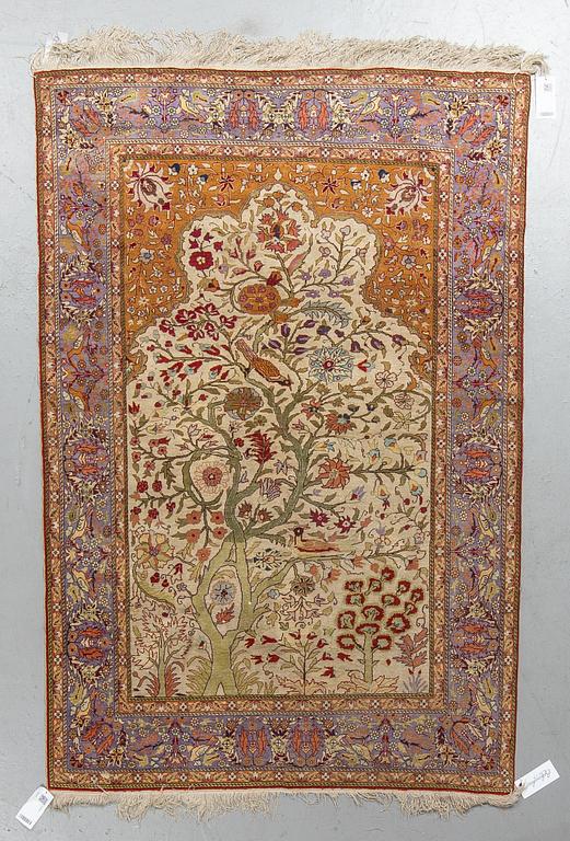 A rug, Old Silk Turkish, ca 180 x 117 cm.