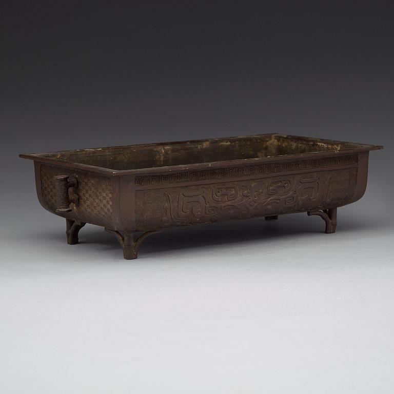 A large Japanese bronze flower pot, Meiji (1868-1912).