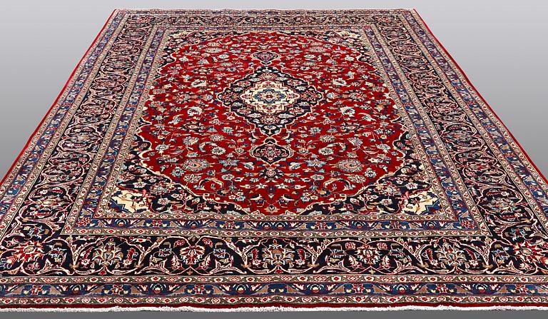 A carpet, Mashad, ca 346 x 248 cm.