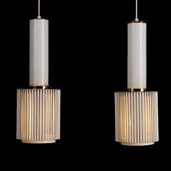 A pair of 'A 111' pendant lights for Valaistustyö.