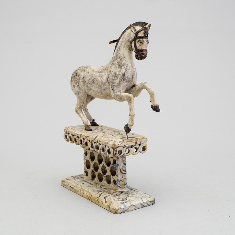 A painted folk art horse figure 19th century.