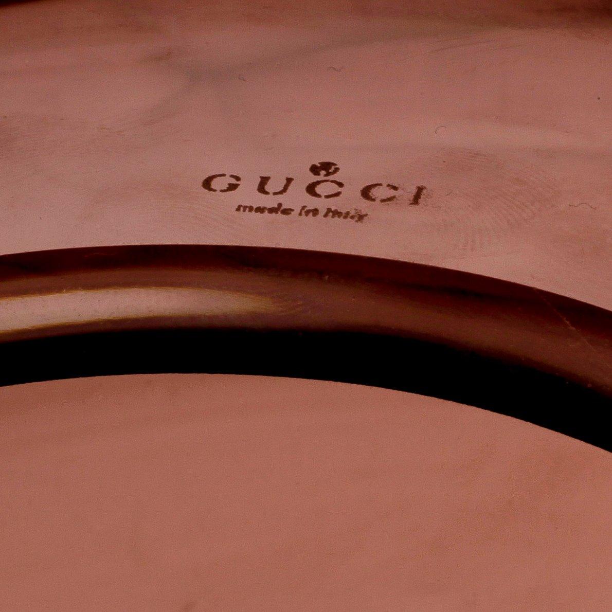 GUCCI, vas.