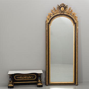 A 19th century mirror with wall table.