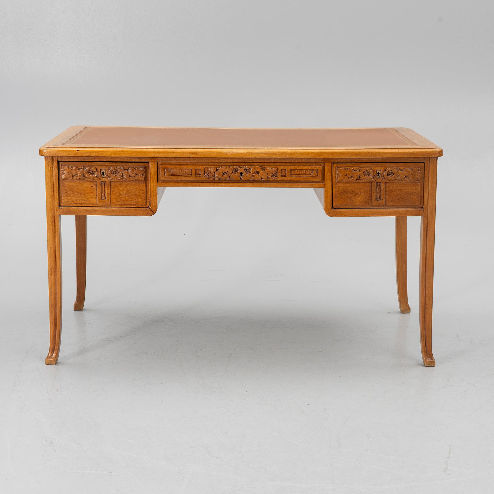 An Art Nouveau desk and chair, early 20th century.