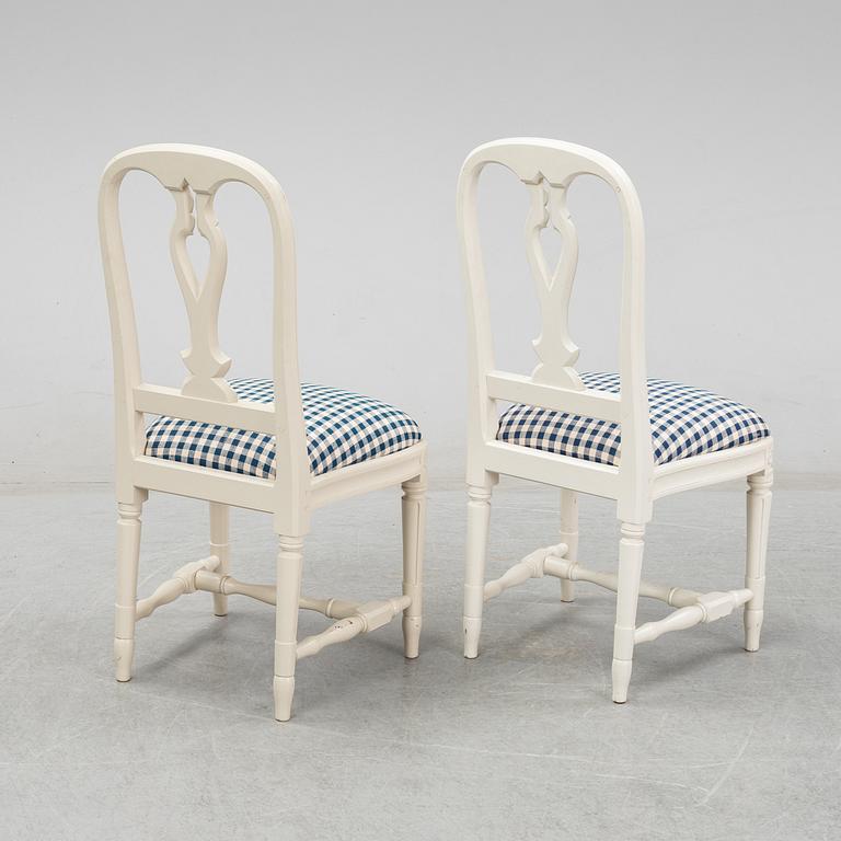 Eight Gustavian style 'Hallunda' chairs from IKEA.