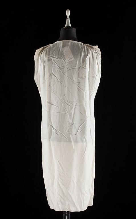 A white silk cocktail dress by Lanvin.