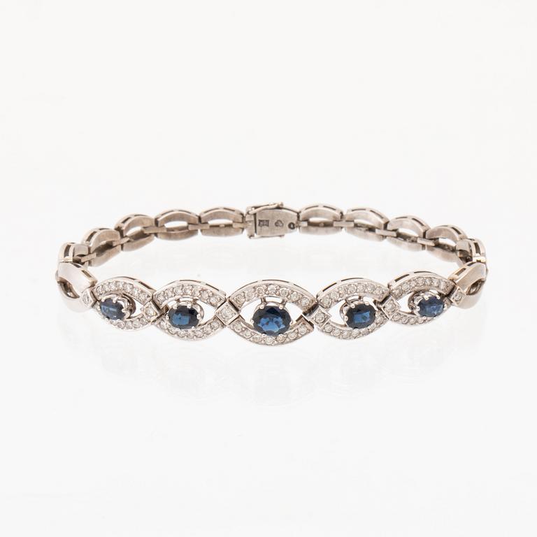 Armband 18K vitguld med ovalt fasetterade safirer samt briljantslipade diamanter, Stockholm.