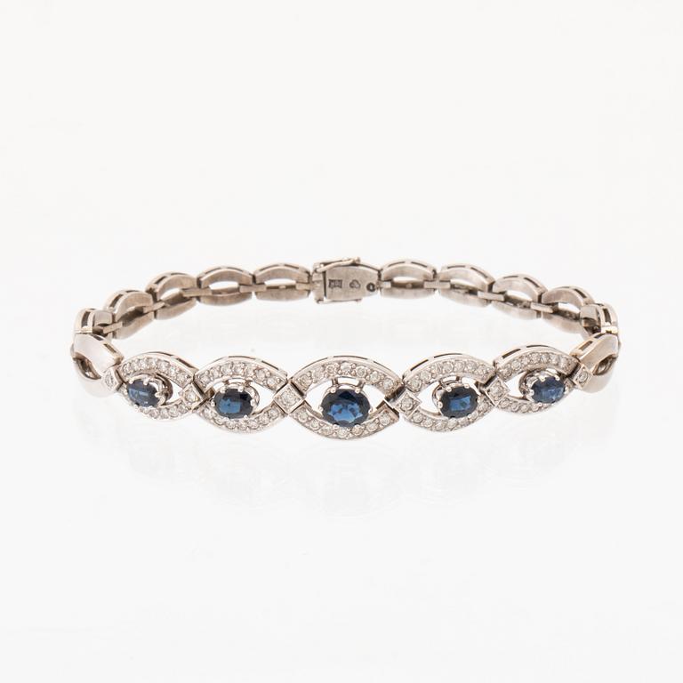 An 18K white gold bracelet set with oval faceted sapphires and brilliant-cut diamonds, Stockholm.