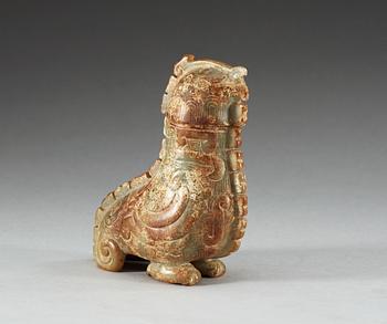 An archaistic nephrite bird shaped covered vessel.