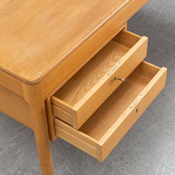 Yngvar Sandström, an oak desk, AB Seffle Möbelfabrik, second half of the 20th century.