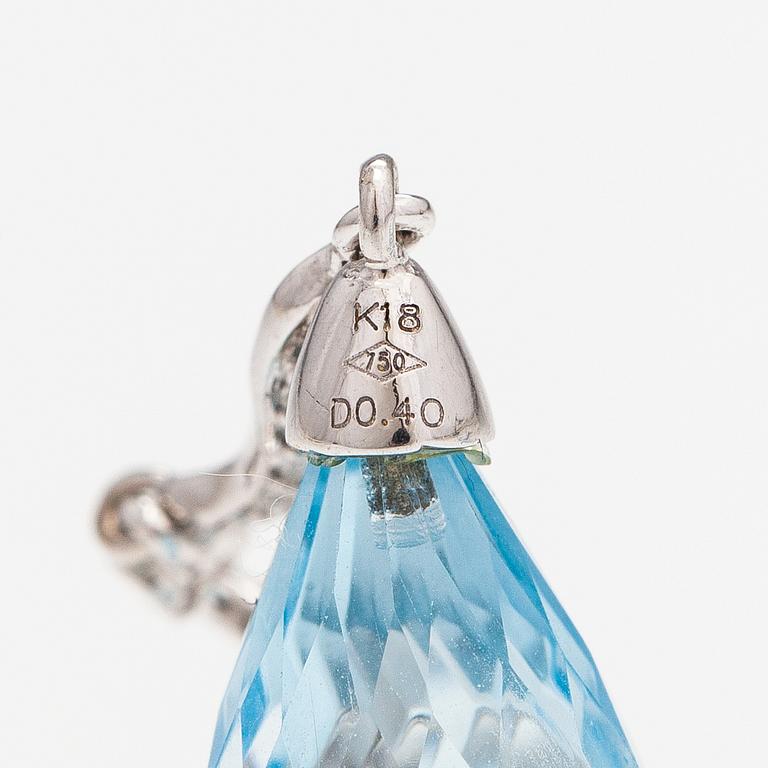 A pair of 18K white gold earrings with topazes and diamonds ca. 0.37 ct in total.