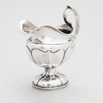 A mid-19th-century  Finnish silver cream jug, maker's mark of Johan Hellgren, Kristinestad 1843.