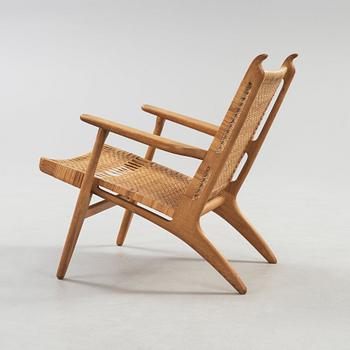 A Hans J Wegner oak and rattan easy chair 'CH-27', Carl Hansen & Son, Denmark,