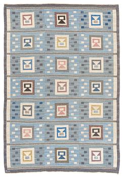 420. Edna Martin, a carpet, 'Flickorna i fönstret', flat weave, c 295 x 202 cm, signed SH.