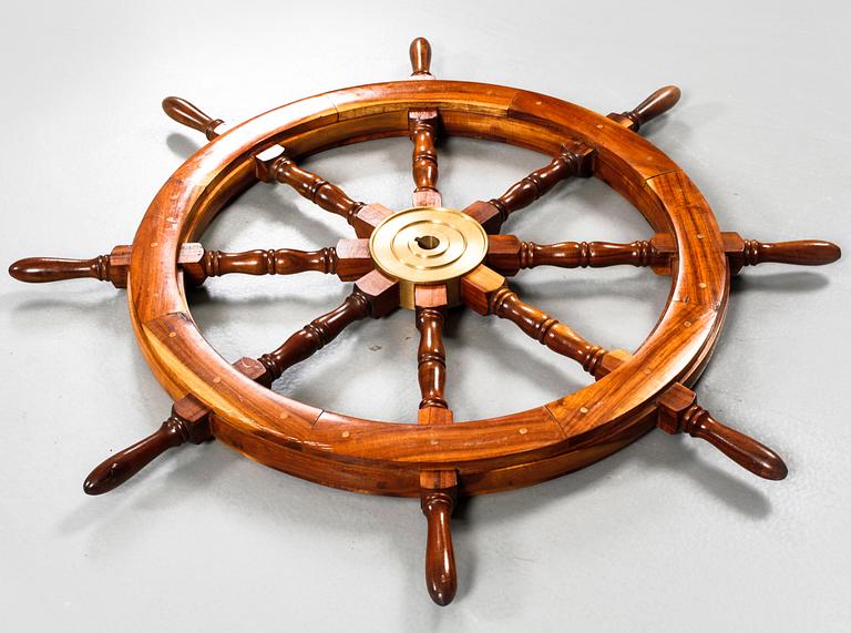 A 20th century boat steering wheel.