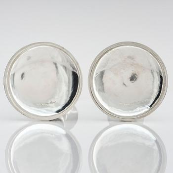 Henrik Ingemansson, a pair of sterling silver and Älvdal porphyry candelsticks, Ingemansson's Smithy, Stockholm, 2002.