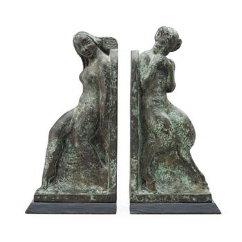 A pair of Axel Gute patinated metal bookends, Sweden 1919.