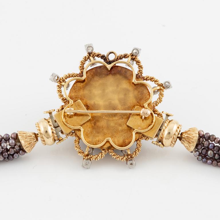 Multi-strand pearl necklace with two clasps set with carved coral, cabochon-cut tourmaline, and brilliant-cut diamonds.
