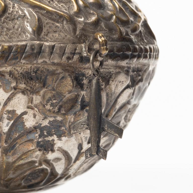 An 20th century british Raj repoussé metal rosewater sprinkler.