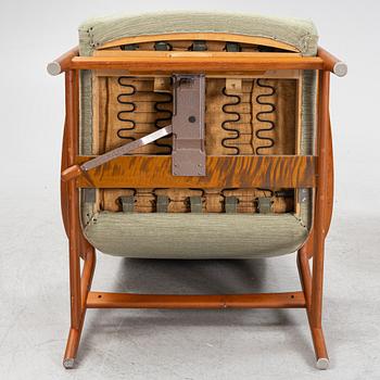 Folke Ohlsson, a 'Duxiesta' armchair with a foot stool, Bra Bohag, Ljungs Industrier, Malmö, 1960's.