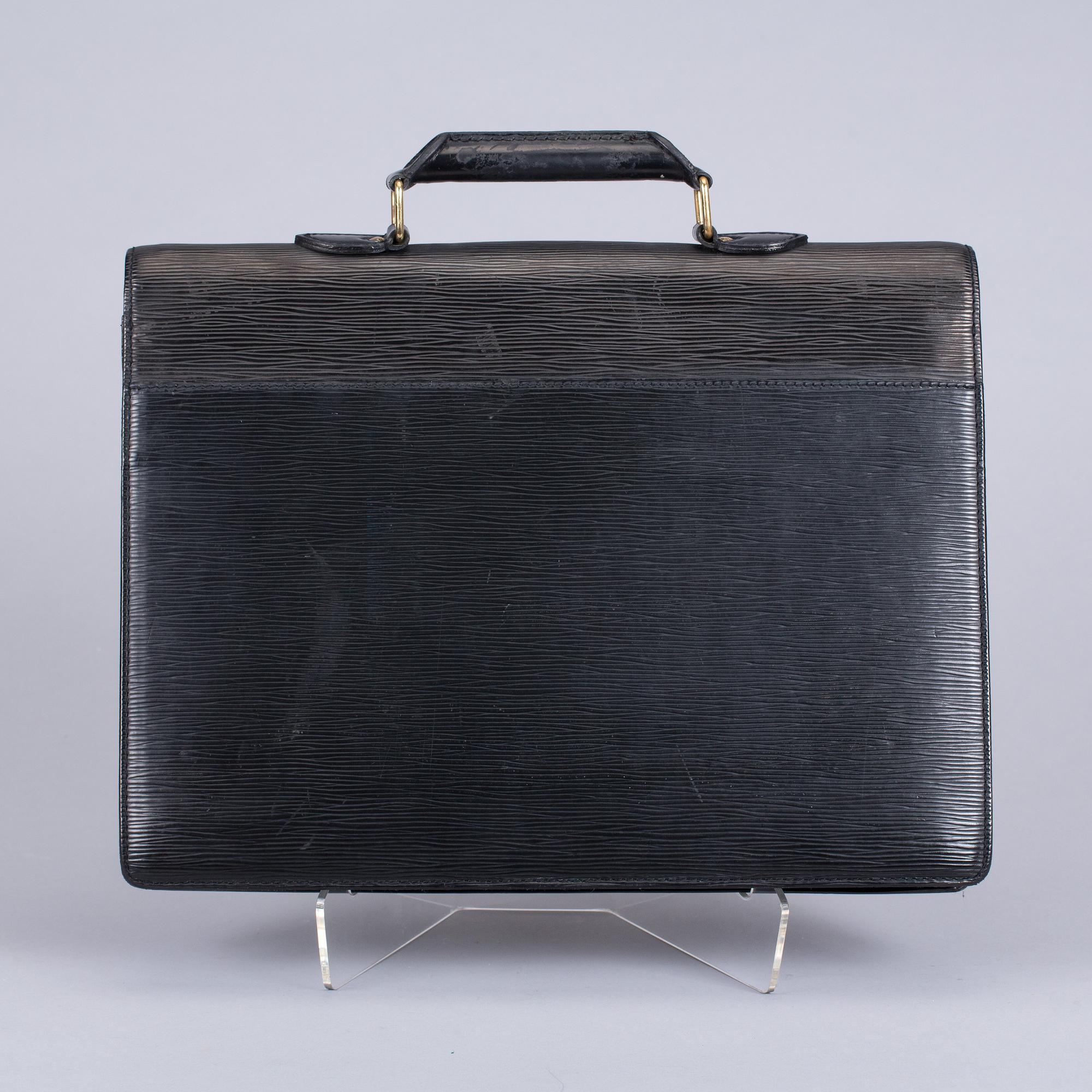 PORTFÖLJ, "Serviette conseiller ambassadeure Epi", Louis Vuitton.