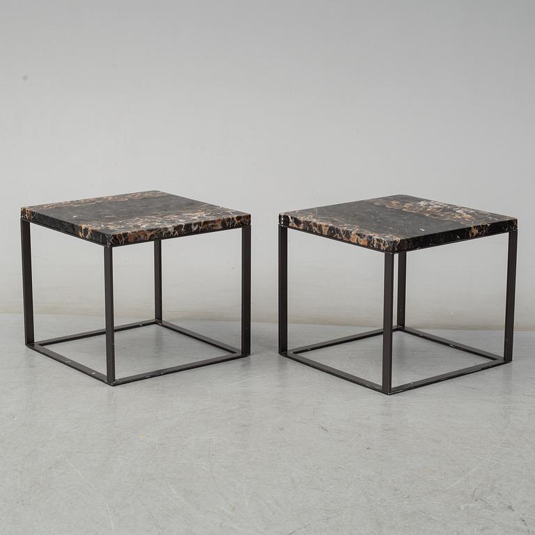 A pair of marble coffee tables from Maxalto, Italy.