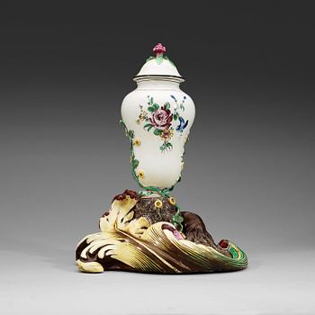1536. A Swedish Marieberg faience vase with cover, dated 1772.