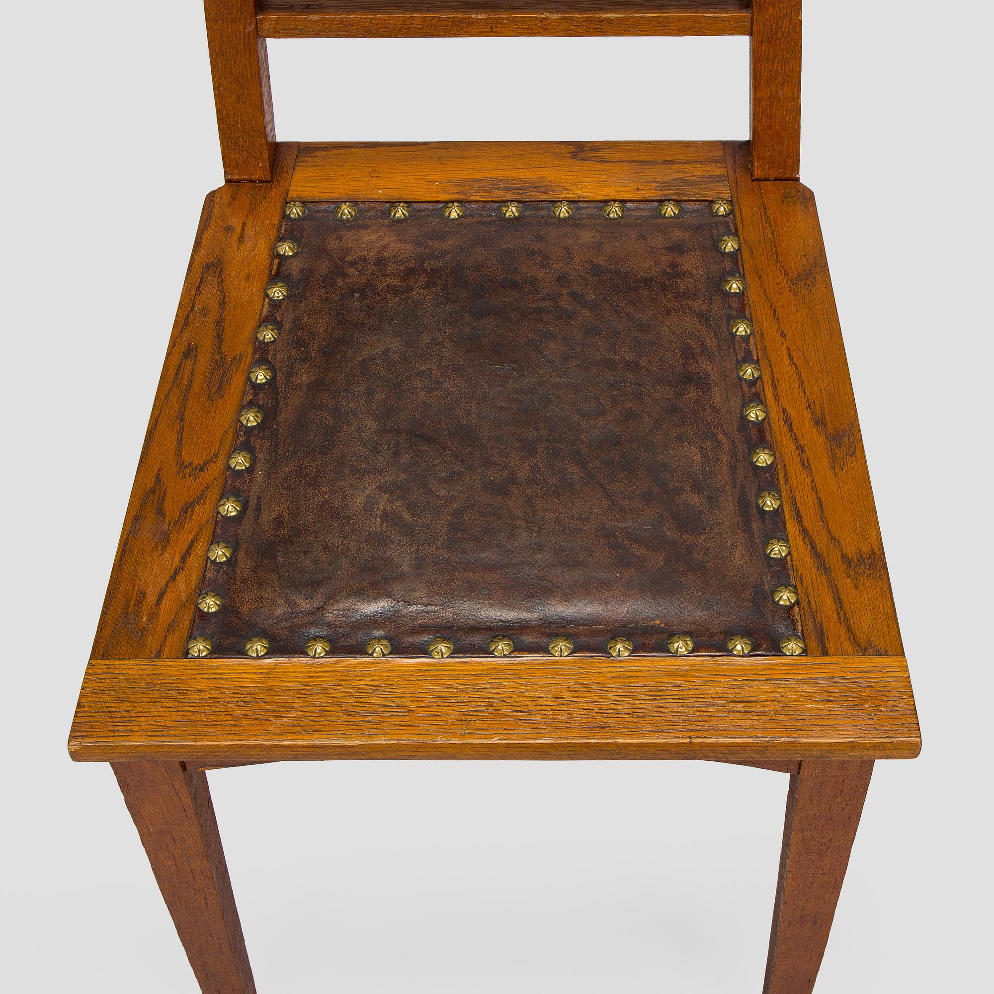 Dining table and six chairs, early 1900.