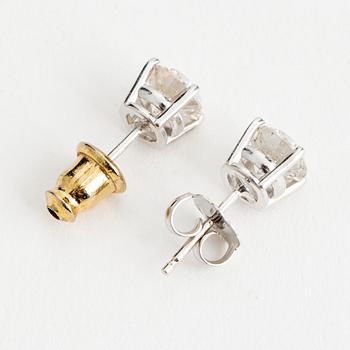 DIAMOND STUDS, 14K white gold with 2 diamonds approx. 1.40 cts.
