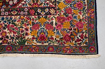 A carpet, semi-antique Kerman, ca 453 x 340 cm.