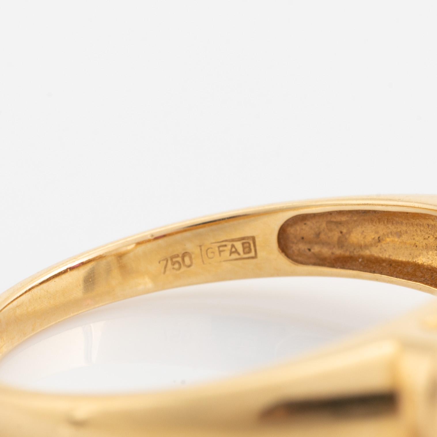 Ring 18K guld med vit topas och cabochonslipade rubiner.