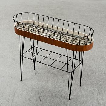 A 1950-60s plant stand.