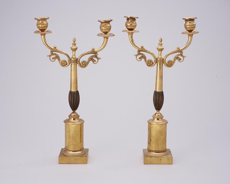 A pair of Swedish Empire 19th century gilt bronze two-light candelabra.