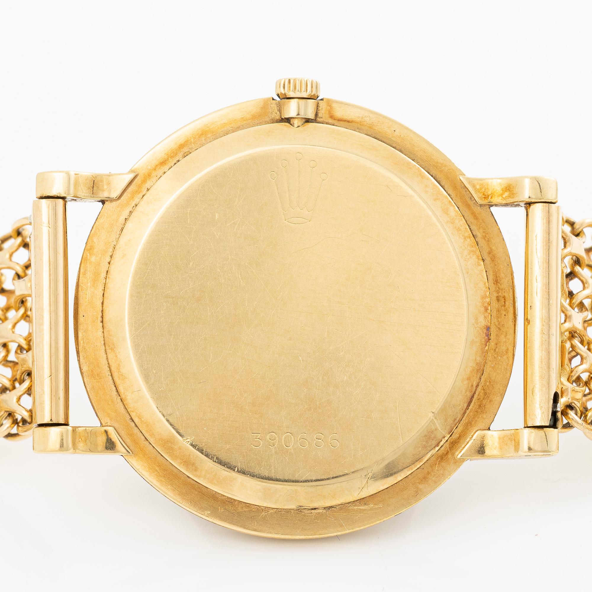 Rolex, 18K gold, with an 18K gold bracelet, wristwatch, 31.5 mm.