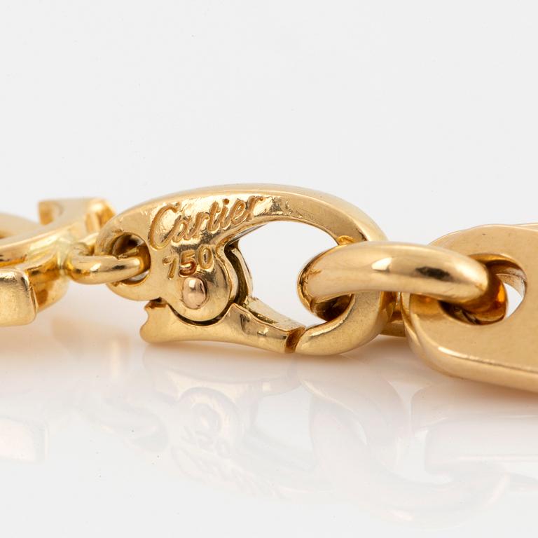 Cartier 18K gold charm bracelet.
