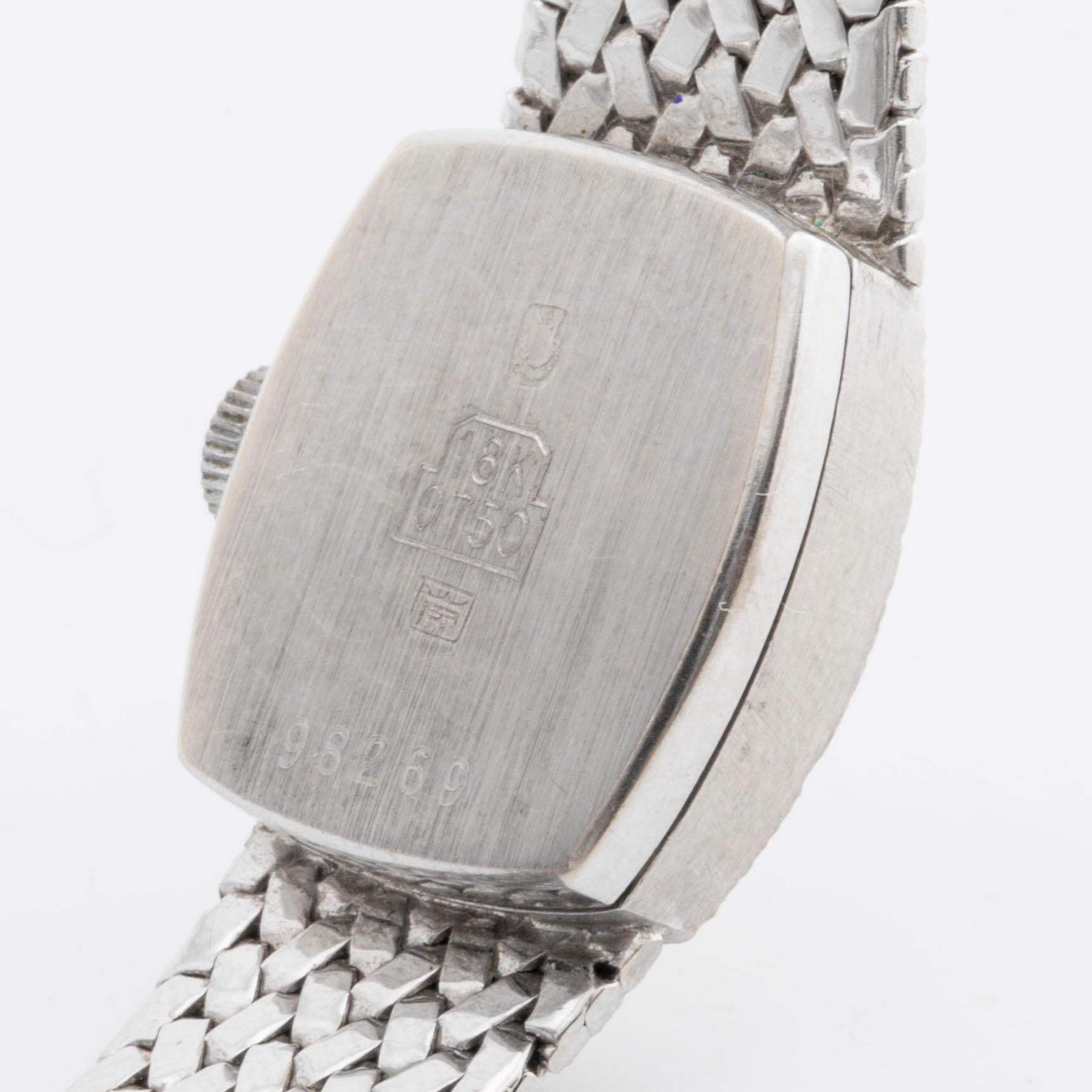 DAMARBANDSUR MOWADO, 18K vitguld, 15 x 17 mm, manuellt verk.