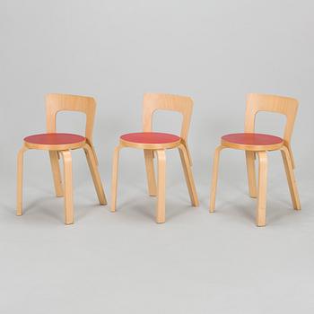 Alvar Aalto, A mid-20th century drop leaf table and three chairs for O.Y. Huonekalu-ja Rakennustyötehdas A.B.