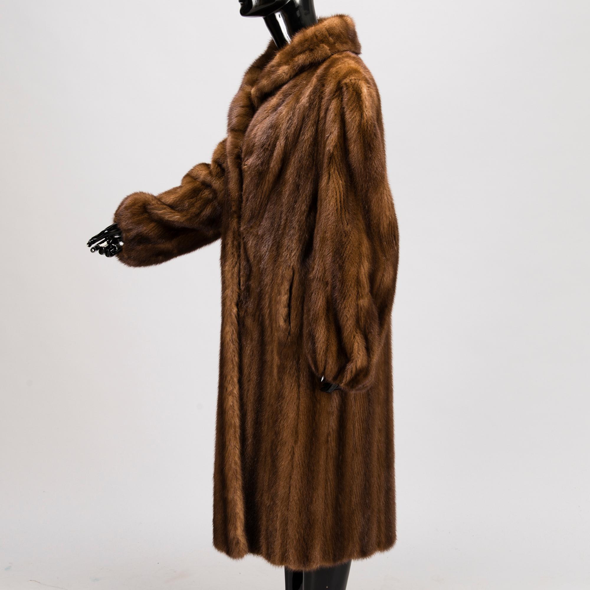 A SAGA MINK FUR COAT.